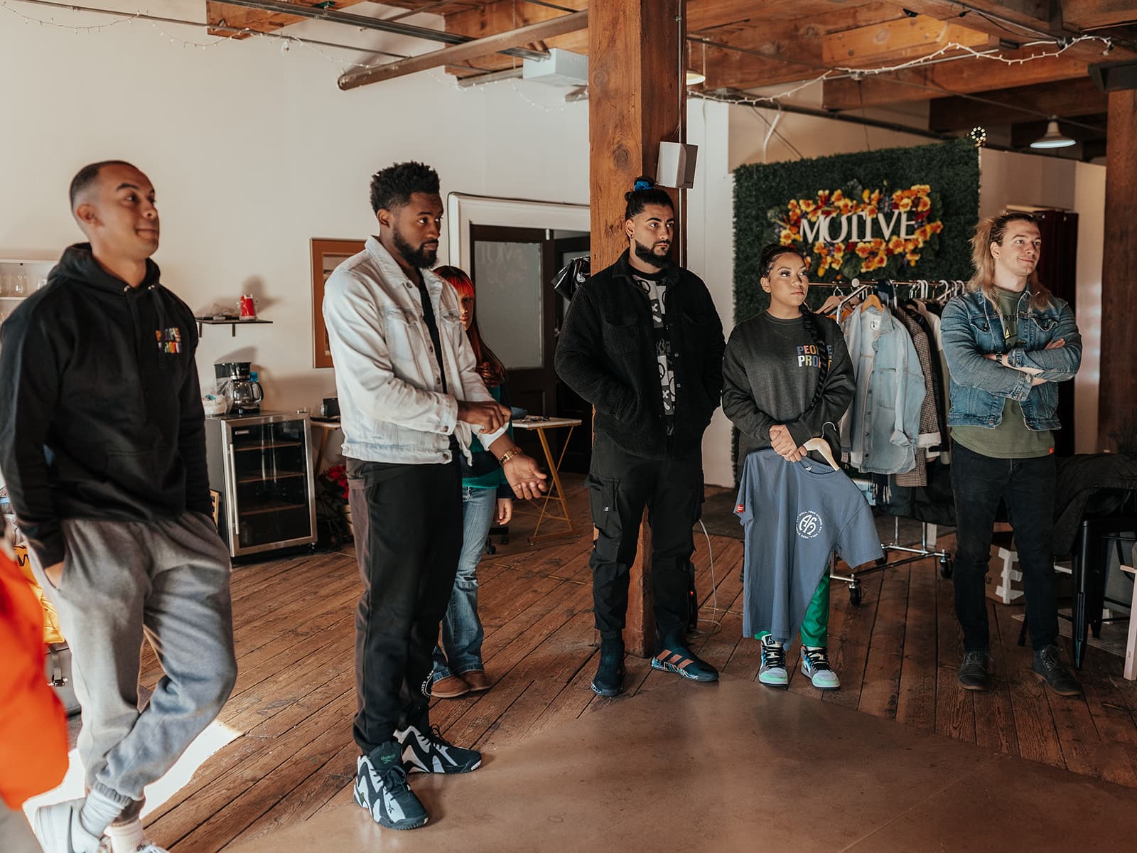 The Associated Humanity team gathered in the studio